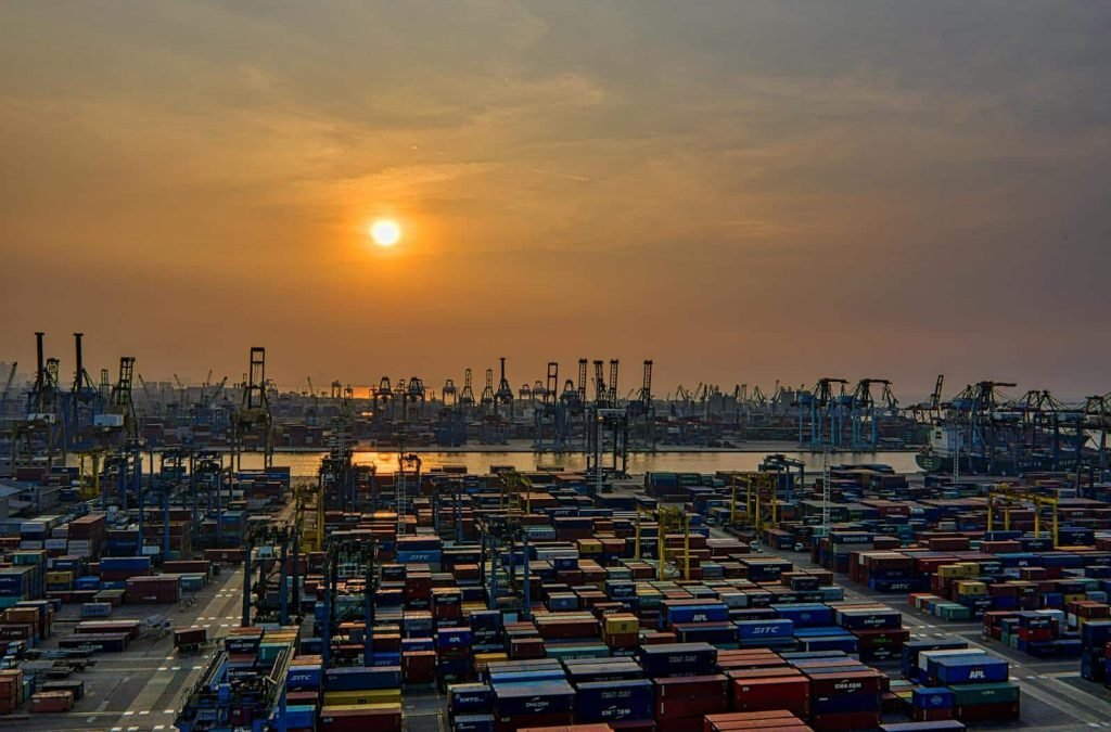 Colourful shipping containers stacked at an export port