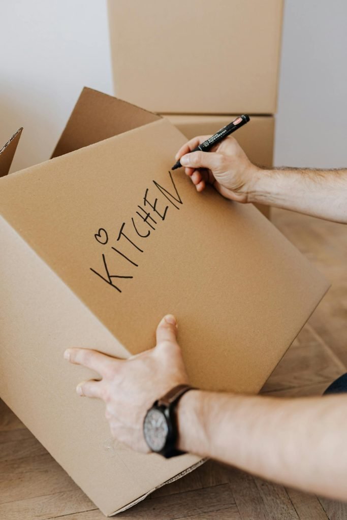 Surveyor reviewing household items during a pre-move walkthrough