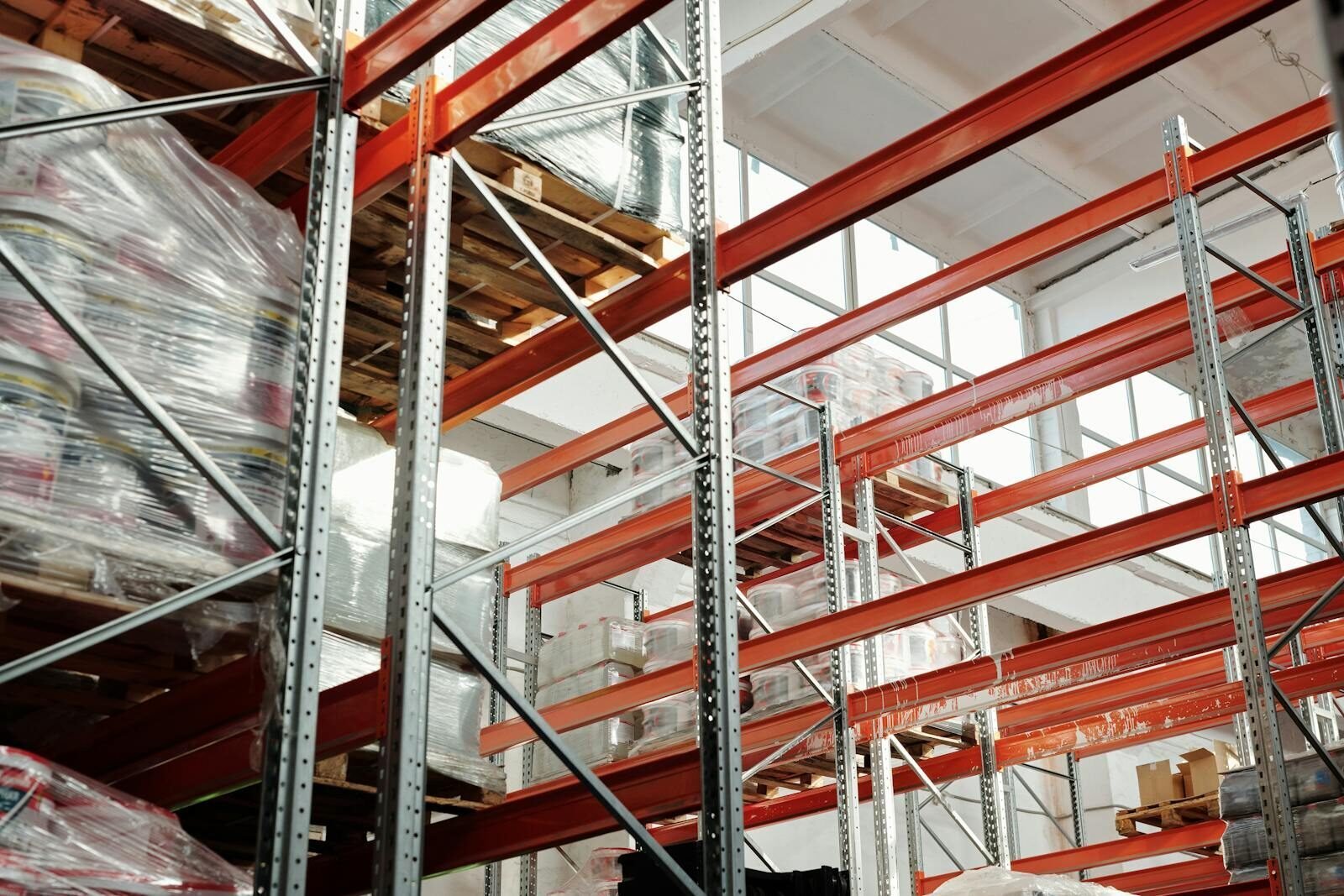 Pallet racking loaded with palletised stock in a distribution centre