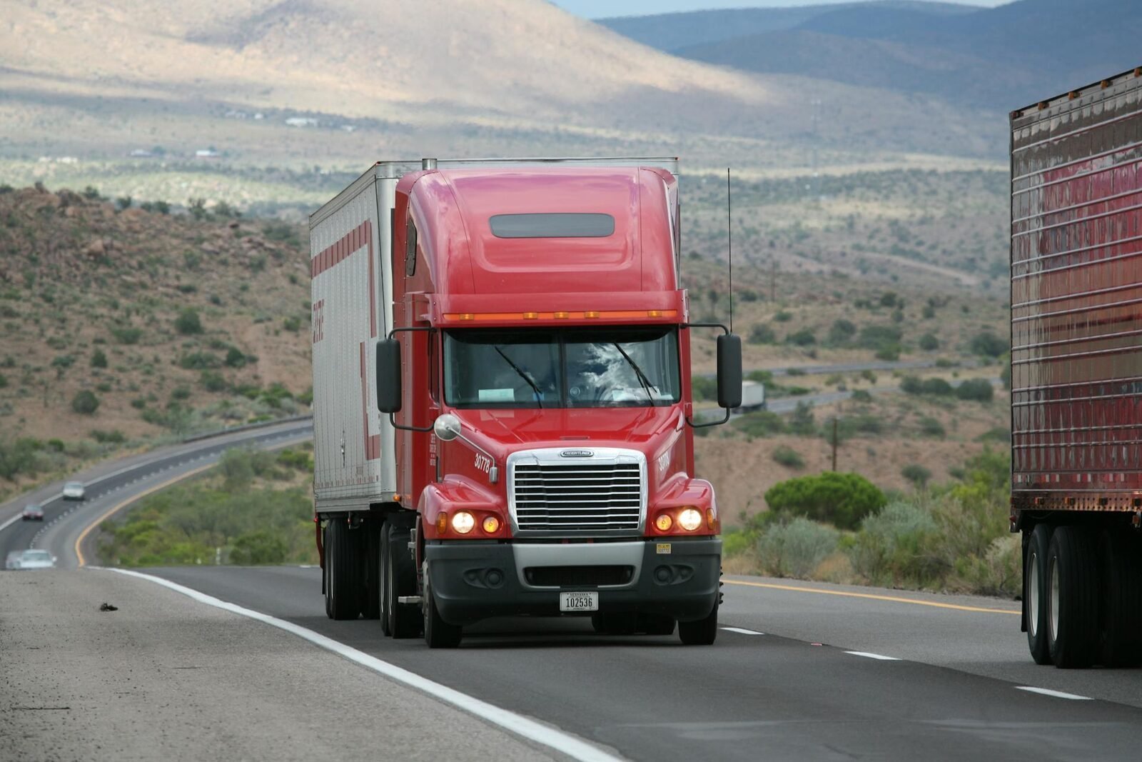 Articulated truck on a mountain highway