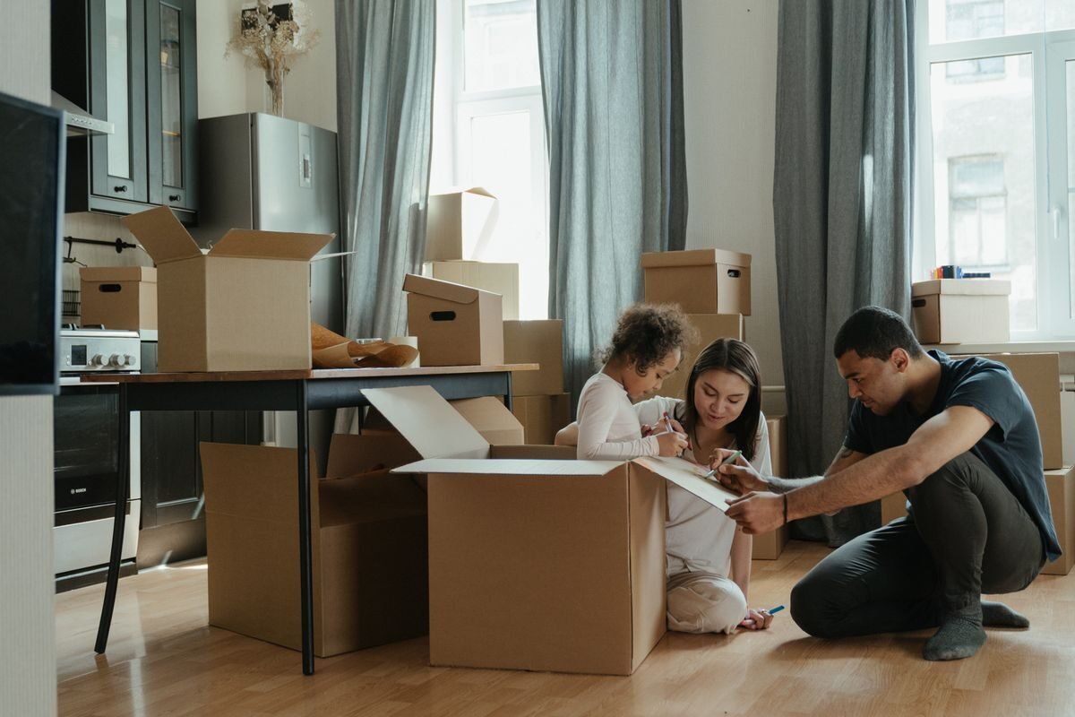 Household goods being packed into cartons before a move
